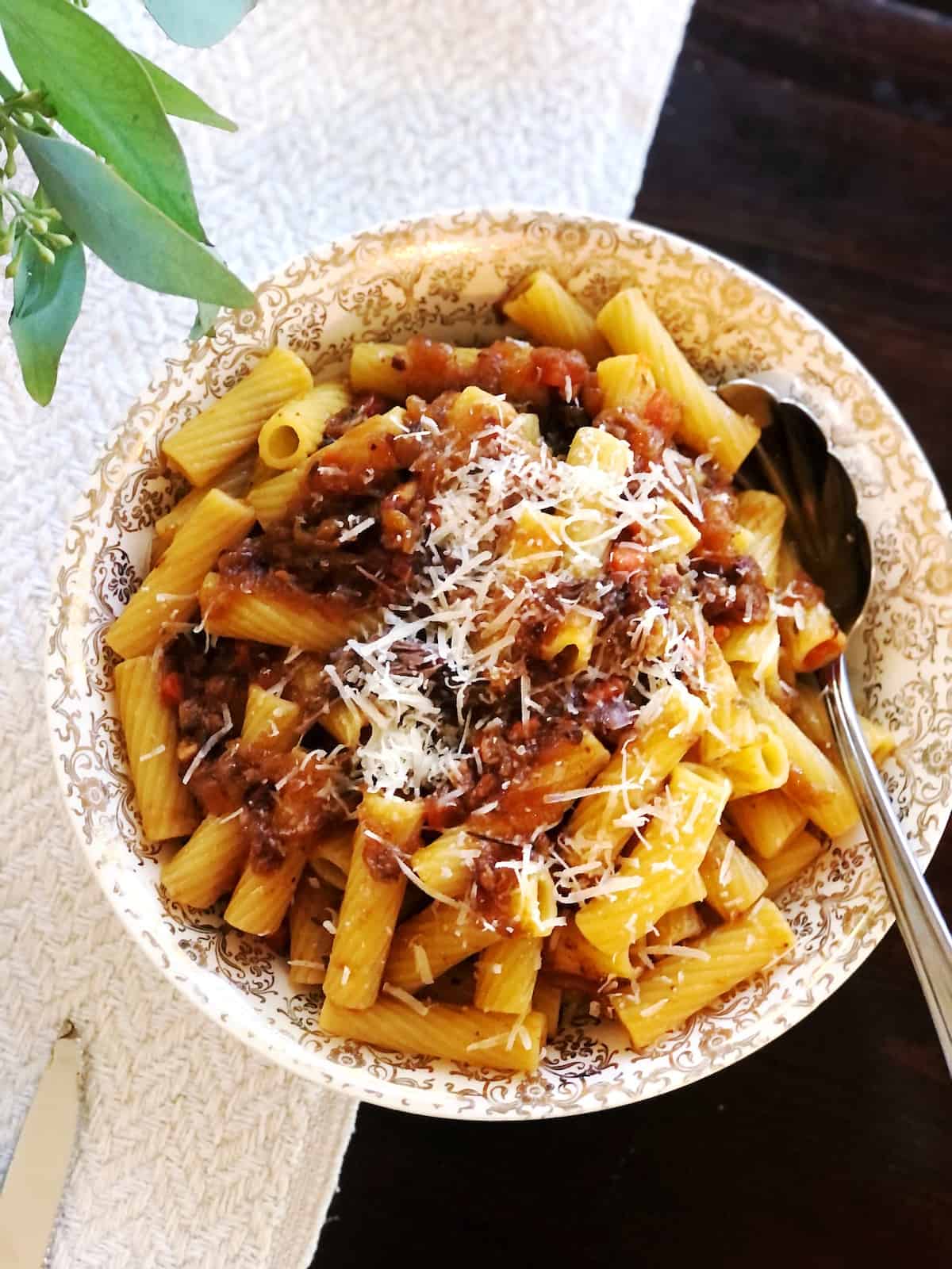 pasta Genovese in bow with fork