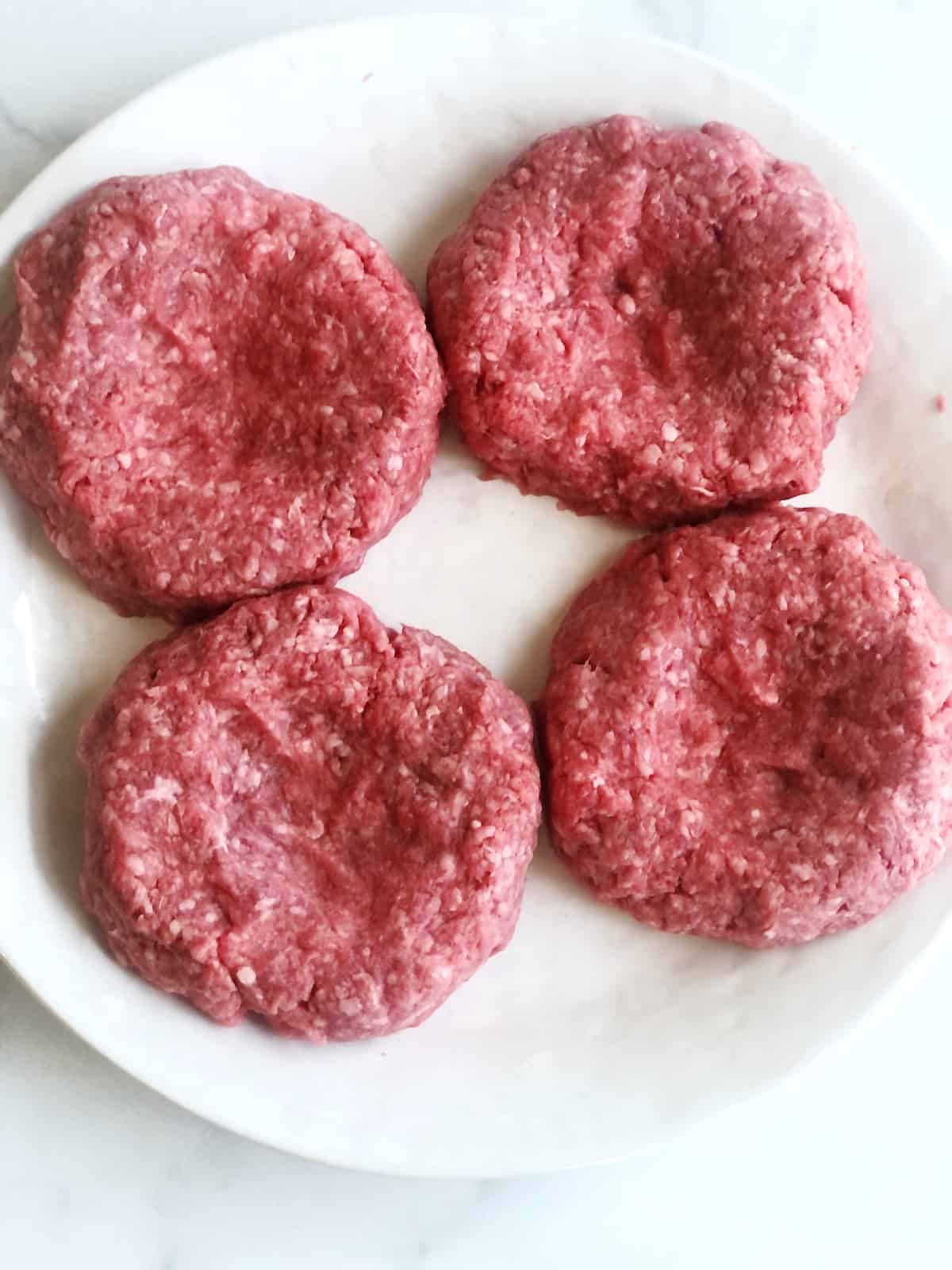 making a well in hamburger patty