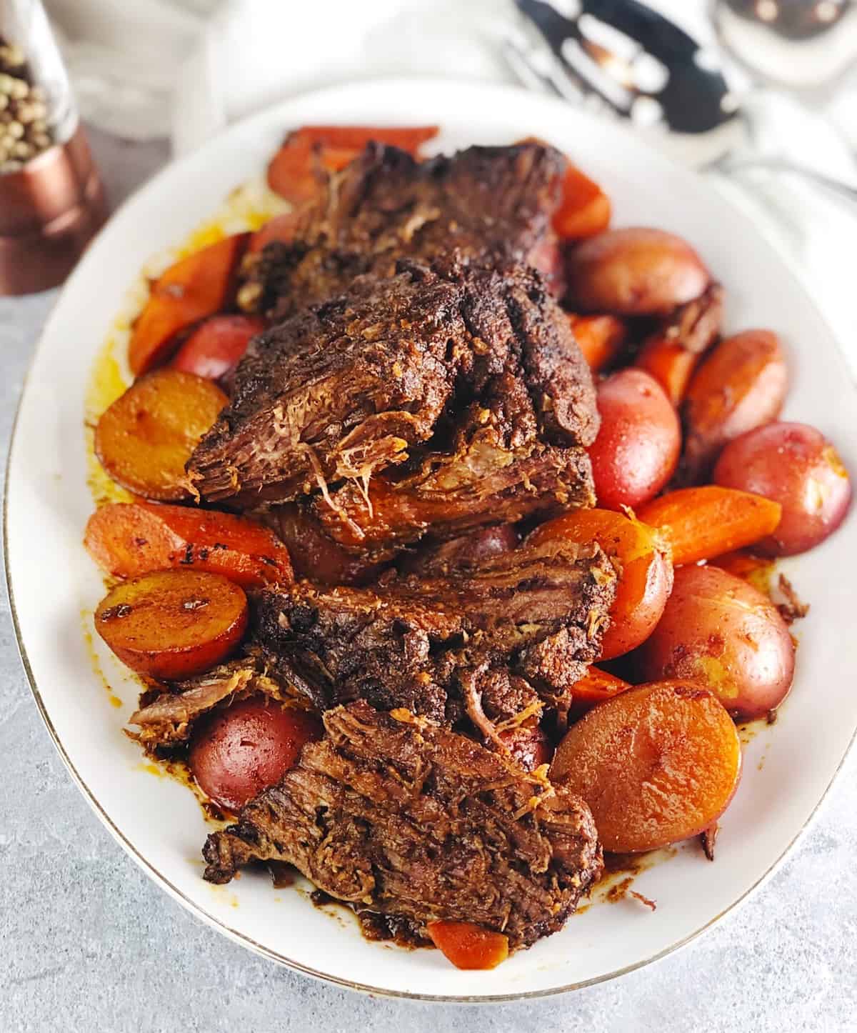 beef brisket on plate with veggies