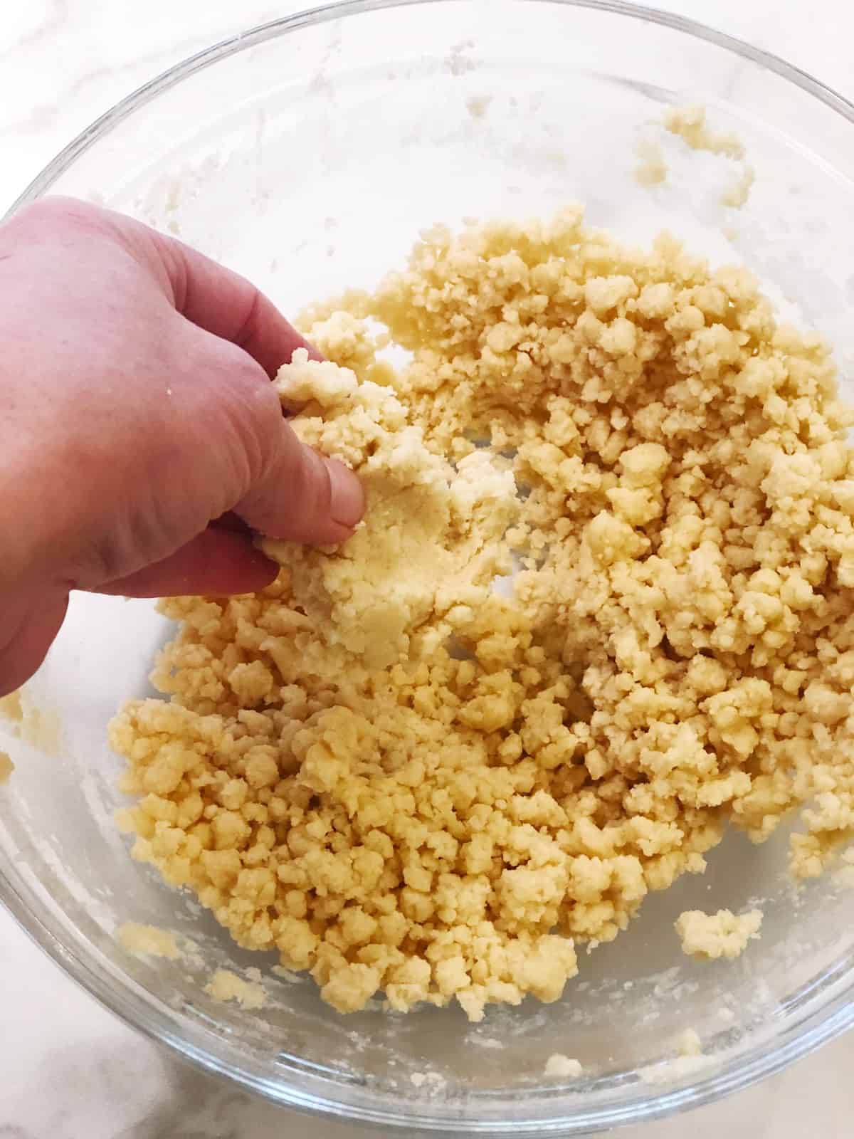 Mixing cardamom shortbread dough.