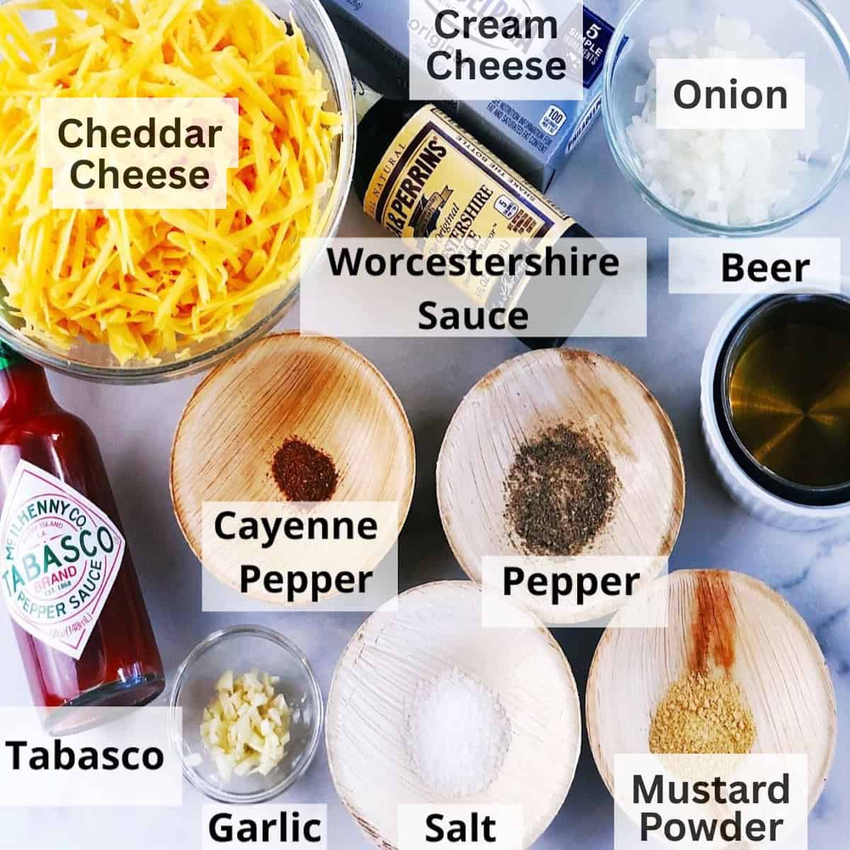 Ingredients for the beer cheese dip on the counter.