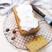 Nutmeg loaf cake with sour cream honey topping.
